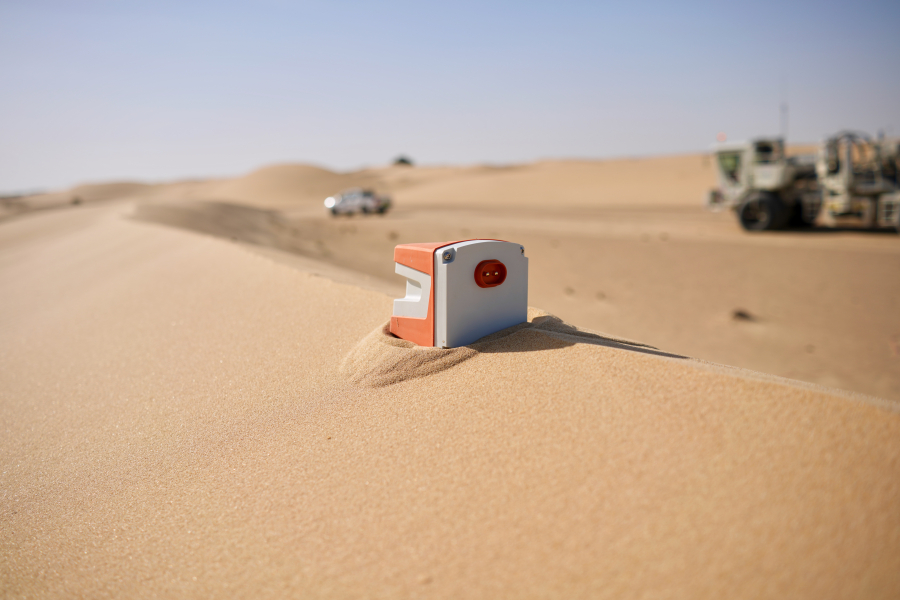 Wing in desert environment with truck
