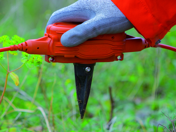 DSU1 508 product in hand with grass field